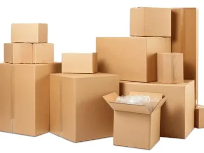 Brown corrugated carton boxes in different sizes for shipping and moving